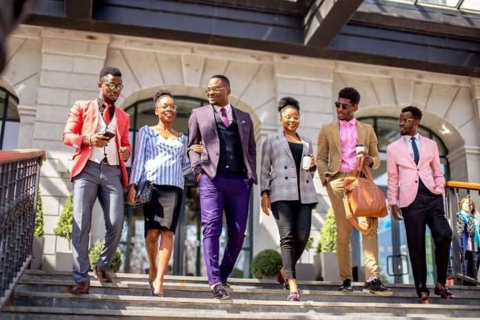 shutterstock_1144854950 - STOCKPAID - Youth,Wearing,Stylish,Clothes,Walking,Downstrairs,After,Party Youth,Wearing,Stylish,Clothes,Walking,Downstrairs,After,Party, Africa Youth In Tourism, Youth in Tourism